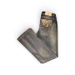 Miss Me faded, boot cut blue jeans for women.